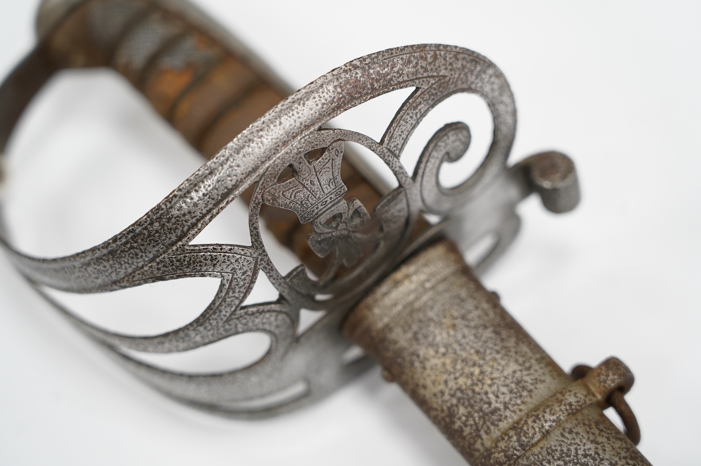 An 1827 pattern Victorian Rifle Officer’s sword, the blade etched with crowned VR and bugle, regulation hilt and scabbard, blade 82.5cm. Condition - poor